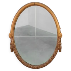 Miroir en chêne doré ovale français sculpté art déco, vers 1925