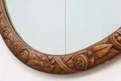 Miroir en chêne doré ovale français sculpté art déco, vers 1925