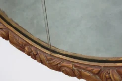 Miroir en chêne doré ovale français sculpté art déco, vers 1925