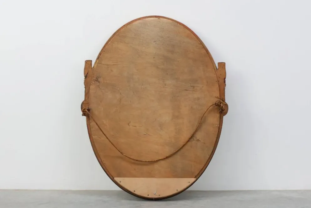 Miroir en chêne doré ovale français sculpté art déco, vers 1925