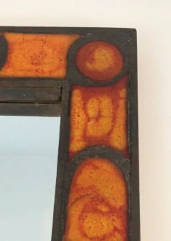 Miroir en céramique dans les tons orangés