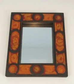 Miroir en céramique dans les tons orangés