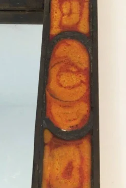 Miroir en céramique dans les tons orangés