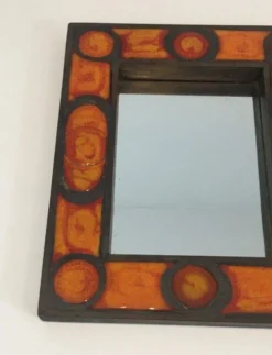 Miroir en céramique dans les tons orangés