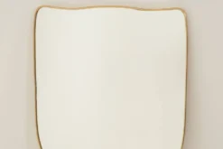 Miroir en laiton doré dans le style de Gio Ponti et des années 1980.