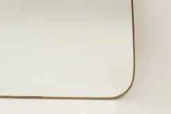 Miroir en laiton doré dans le style de Gio Ponti. Années 1980/90.