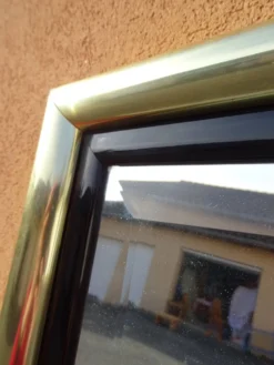 Miroir en laiton et plexiglas, années 80