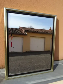 Miroir en laiton et plexiglas, années 80