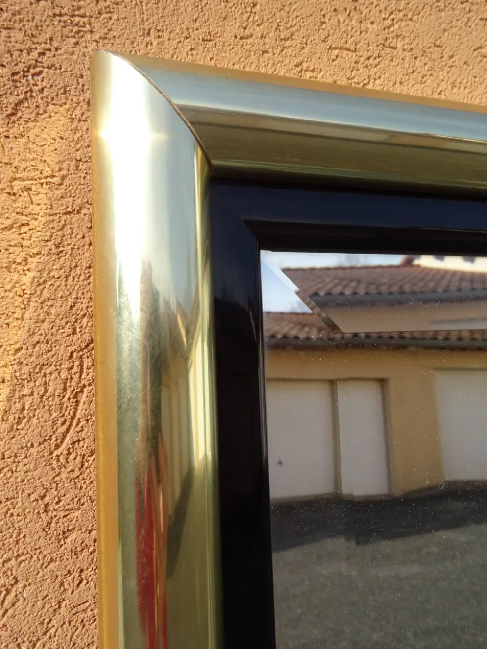 Miroir en laiton et plexiglas, années 80