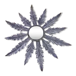 Miroir en métal à décor de feuillage
