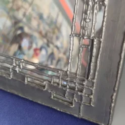 Miroir en étain sur support bois de style brutaliste