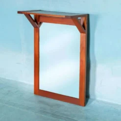 Miroir en teck danois avec étagère pour chapeaux des années 1960.