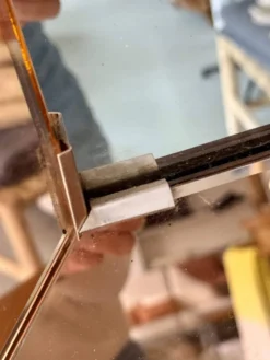 Miroir facetté à encadrement rosé – Italie, années 80