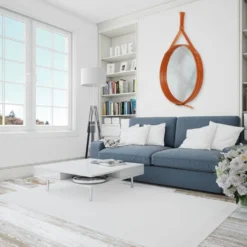 Miroir fait main de style J. Adnet en cuir tanné végétal de couleur tan, ø 70 cm