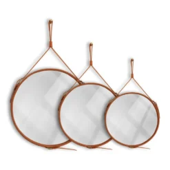 Miroir fait main de style J. Adnet en cuir tanné végétal de couleur tan, ø 70 cm