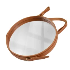 Miroir fait main de style J. Adnet en cuir tanné végétal de couleur tan, ø 70 cm