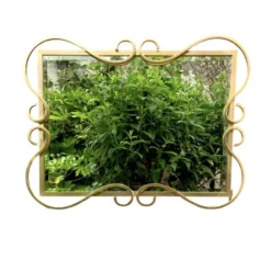 Miroir Hollywood Regency biseauté en aluminium anodisé doré