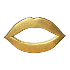 Miroir « lèvres » en plâtre doré à la feuille d’or