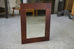 Miroir moderniste en placage d'acajou 1950's