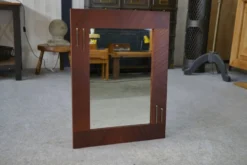 Miroir moderniste en placage d'acajou 1950's