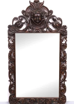 Miroir monumental ancien du XVIIIe siècle en chêne, orné d'un chérubin, de Hollande.