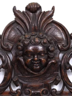 Miroir monumental ancien du XVIIIe siècle en chêne, orné d'un chérubin, de Hollande.