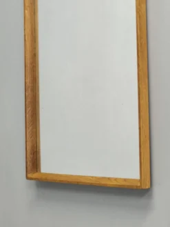 Miroir mural danois en chêne des années 60.