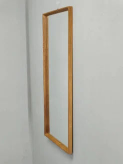 Miroir mural danois en chêne des années 60.