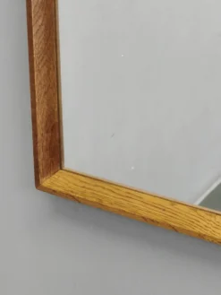 Miroir mural danois en chêne des années 60.