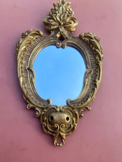 Miroir mural décoratif ovale de style Louis XV