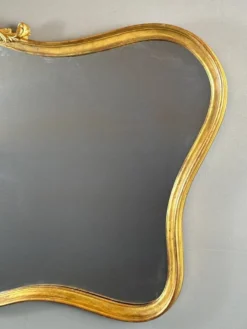 Miroir mural de style Louis XV, XXe siècle