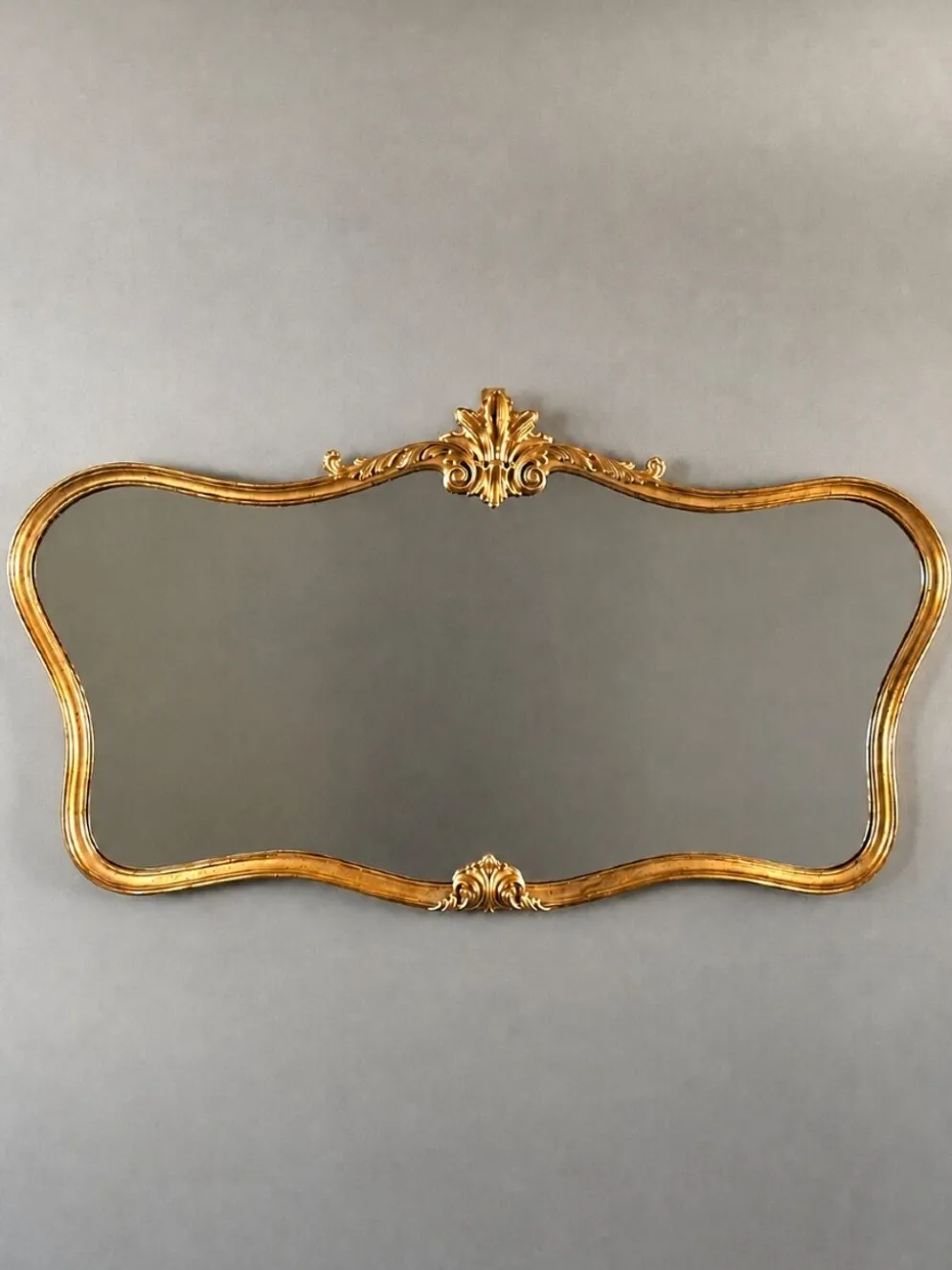 Miroir mural de style Louis XV, XXe siècle