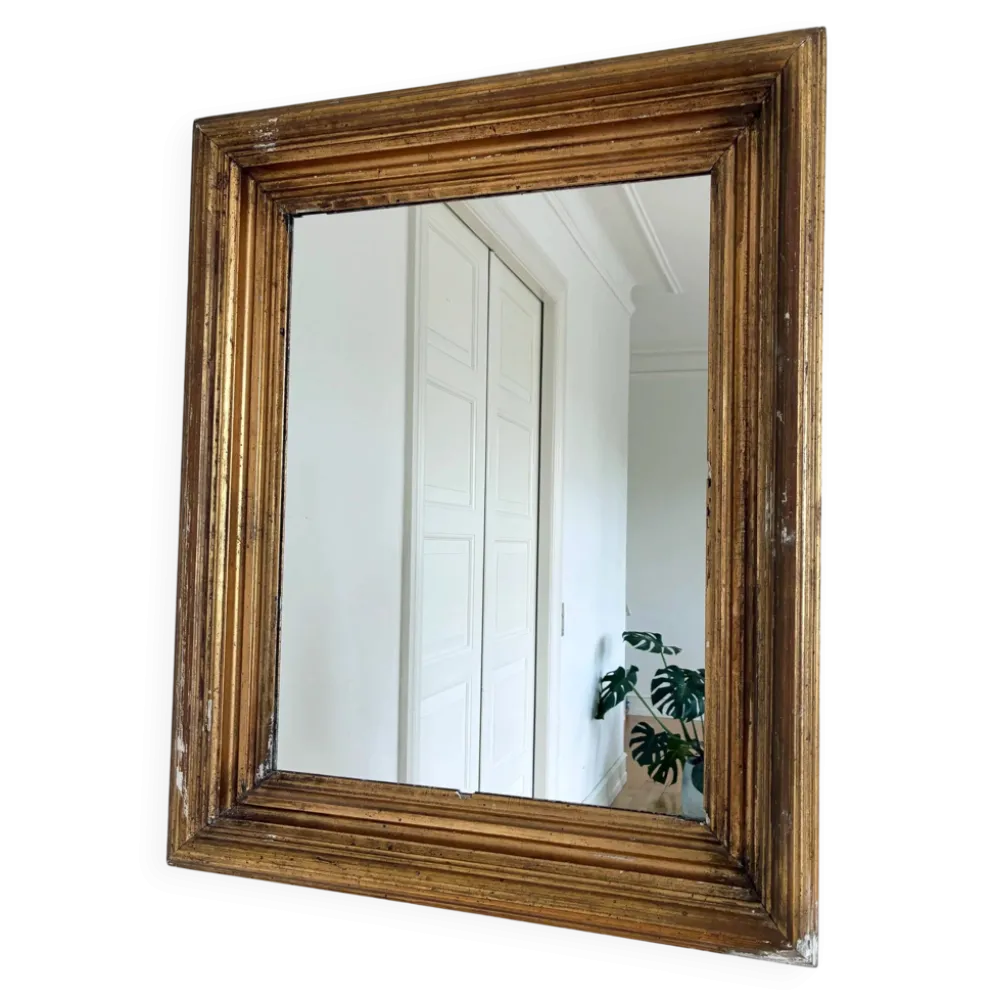 Miroir mural en bois doré antique en or