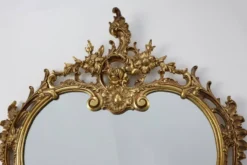 Miroir mural en métal orné de style Louis XVI du 20e siècle avec des flamboiements rococo, Fra