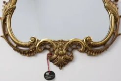 Miroir mural en métal orné de style Louis XVI du 20e siècle avec des flamboiements rococo, Fra
