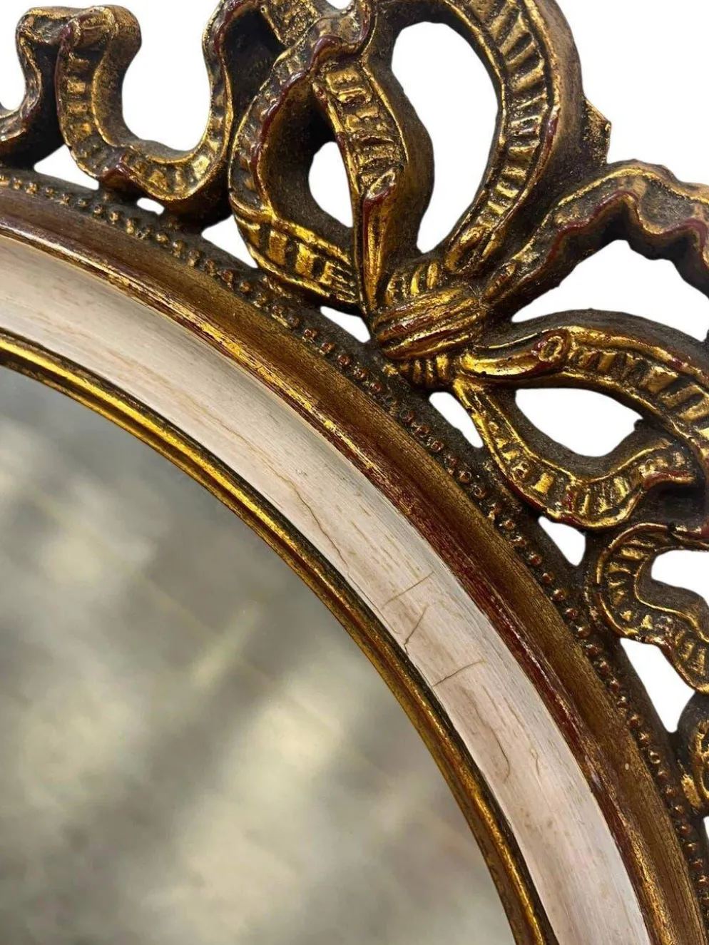 Miroir mural ovale baroque vintage à décor de noeud