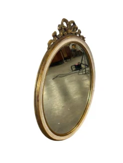 Miroir mural ovale baroque vintage à décor de noeud