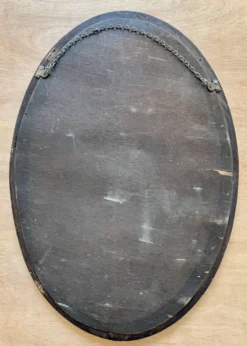 Miroir mural ovale en acajou ancien