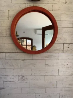 Miroir mural rond orange corail en bois recouvert de tissu - style Mid‑Century, 1950s