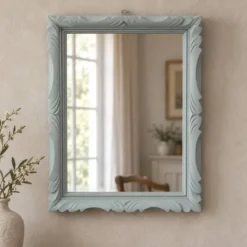 Miroir mural vintage en bois sculpté bleu-vert – style rocaille – H48 cm