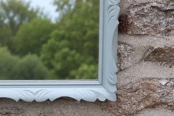 Miroir mural vintage en bois sculpté bleu-vert – style rocaille – H48 cm