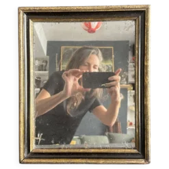 Miroir Napoléon III en bois noir et doré, XIXe siècle