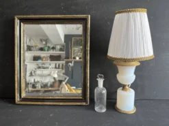 Miroir Napoléon III en bois noir et doré, XIXe siècle