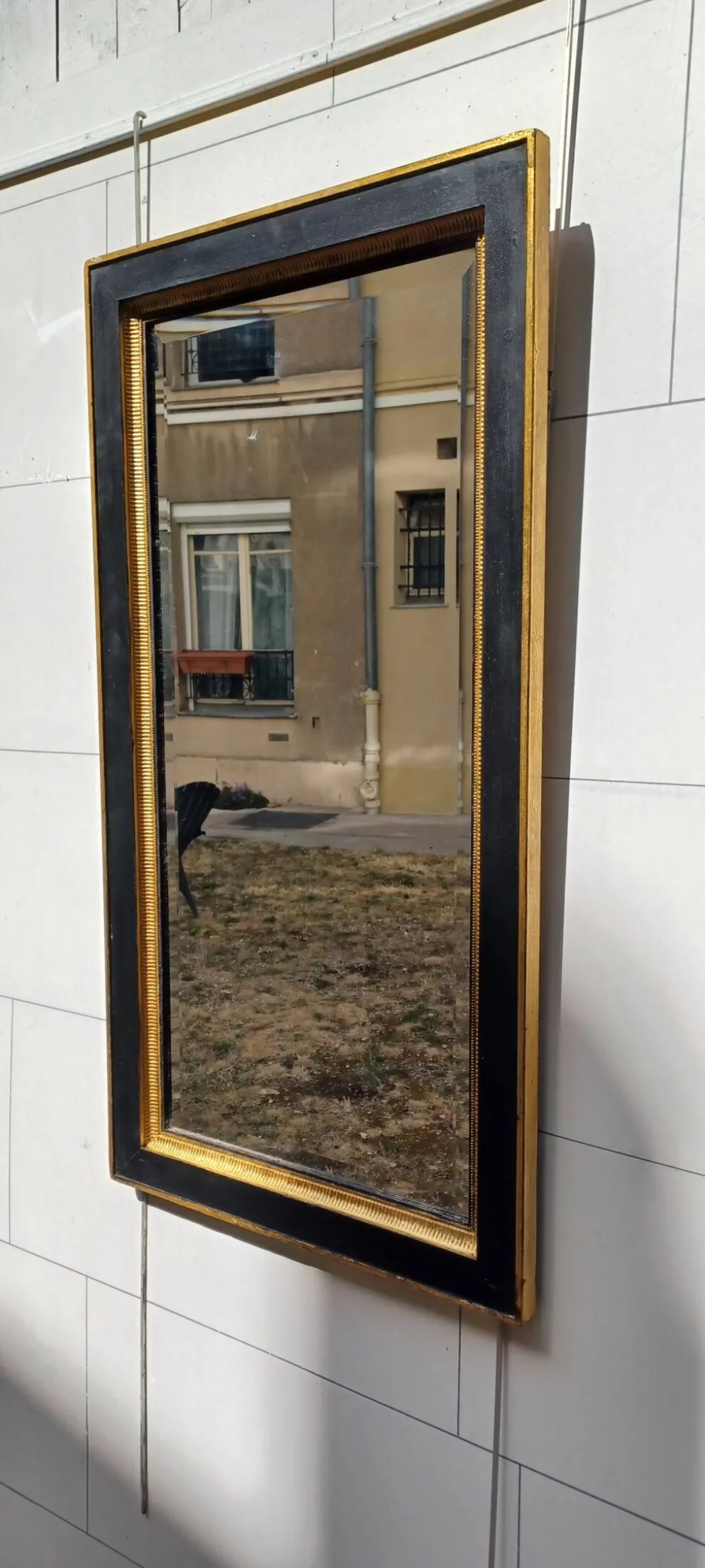 Miroir noir et dore de style art deco
