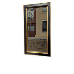 Miroir noir et dore de style art deco