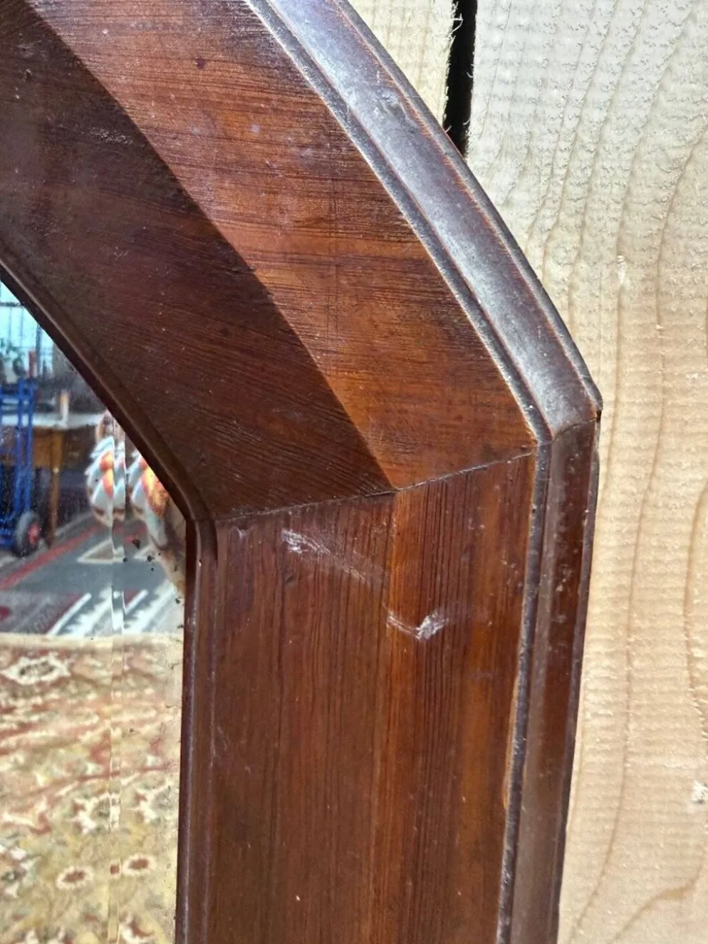 Miroir octogonal biseauté – Époque 1900 – Cadre bois teinté acajou