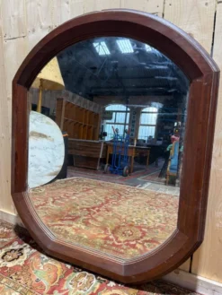Miroir octogonal biseauté – Époque 1900 – Cadre bois teinté acajou