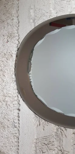 Miroir oval art deco un fond miroir fumé et un miroir par dessus biseauté 58x81cm