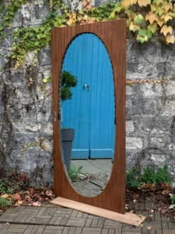 Miroir oval biseauté sur porte art déco Acajou 79x162