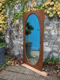 Miroir oval biseauté sur porte art déco Acajou 79x162